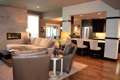 Inspiration for a large contemporary formal and open concept dark wood floor and brown floor living room remodel in Other with beige walls, a standard fireplace, a tile fireplace and no tv