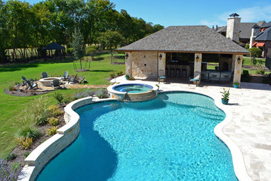 Inspiration for a mid-sized modern backyard custom-shaped natural pool in Dallas with a water slide and decking.