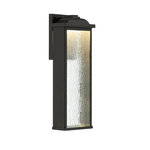 Eurofase - Venya 1 Light Sconce, Black - The Venya collection highlights a thick glass panel with a waterfall texture that is securely placed at the front and back of this rich black frame. Capturing the light within each crevasse, the integrated LED creates a 3D effect as the light grazes against the surface. The LED recessed within perfectly illuminates your space without any hot spots for a flawless brilliance.