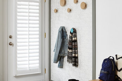 Beach style entryway photo in Toronto