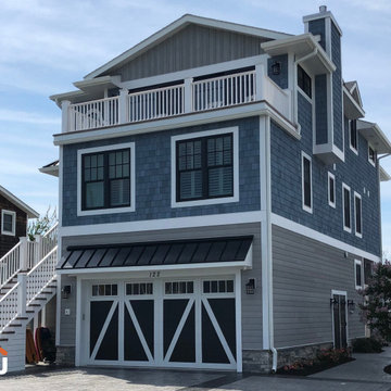 Coastal - Bracing Blue NuCedar Shingles and Argos Modern Shiplap Siding