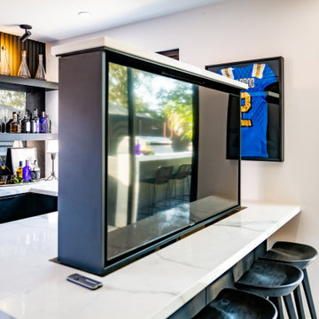 Pop-Up TV Within a Bar Counter