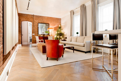 Example of a mid-sized trendy formal and enclosed light wood floor and beige floor living room design in Orange County with beige walls, no fireplace and no tv