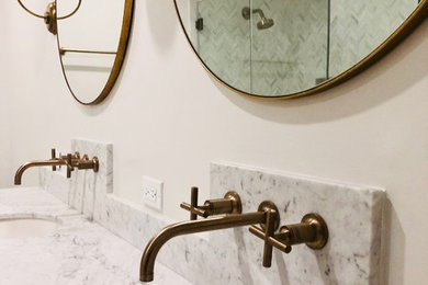 Example of a large eclectic master porcelain tile alcove bathtub design in Los Angeles with white walls, an undermount sink and a hinged shower door