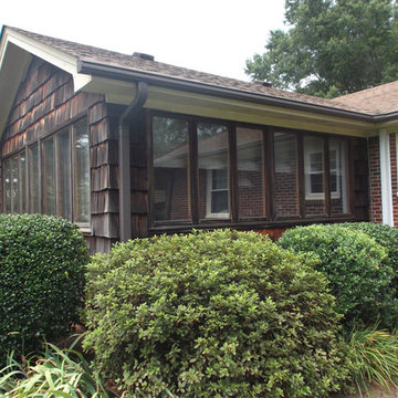 Before: Sunroom with Deteriorating Wood Siding