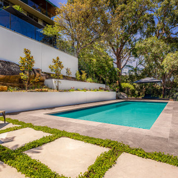 Outdoor entertainment area (Landscaping, Decking, Pool and Tiling.)
