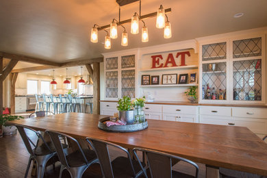 Example of a country dining room design in Other