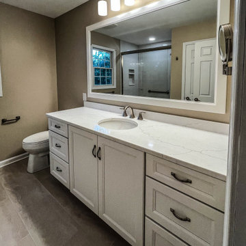 Timeless White Vanity Paired with Luxury Tiled Shower