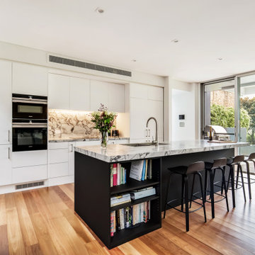 Kitchen with Dolomite splash back and benchtops