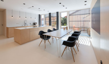 5 Küchen mit Holz – mal mehr mal weniger