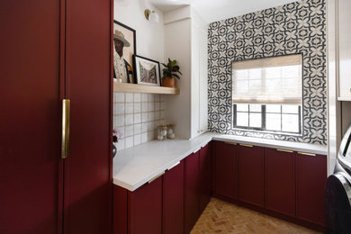 Dedicated laundry room - small transitional u-shaped dedicated laundry room idea in Phoenix with shaker cabinets, quartz countertops, a side-by-side washer/dryer and white countertops