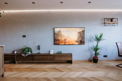 Свежая идея для дизайна: гостиная комната в стиле модернизм с акцентной стеной - отличное фото интерьера