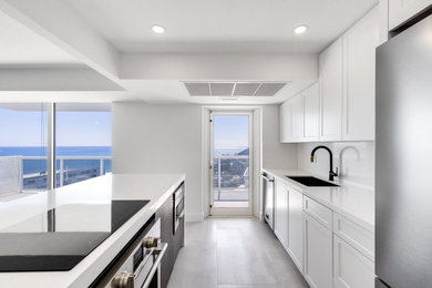Example of a minimalist kitchen design in Miami