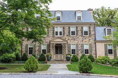 Example of a farmhouse exterior home design in Philadelphia