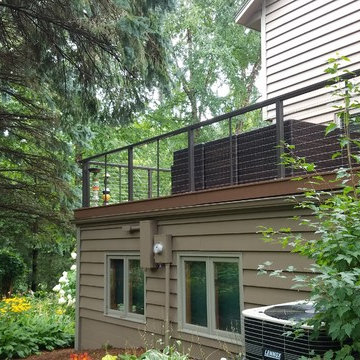 Brown Deck with Black Railings