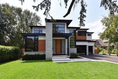Example of a minimalist exterior home design in Toronto
