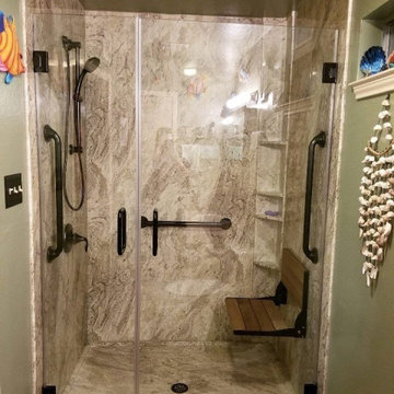 Valencia Granite smooth wall shower w/ frameless door