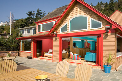 Patio container garden - large contemporary backyard stone patio container garden idea in Seattle with no cover