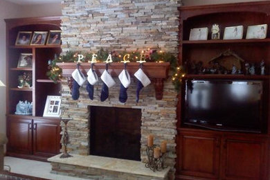 Elegant family room photo in Omaha