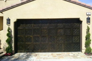 Knotty alder wood Carriage House Garage Door with decorative 2" Clavos