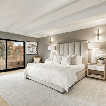 After - Channel-Tufted Headboard Against the Window Wall
