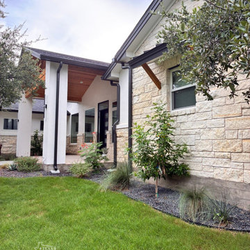 Black seamless gutter installation - Custom home in Georgetown, Texas