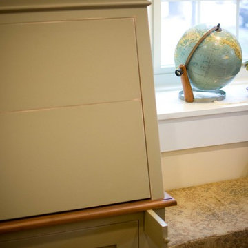 Computer resides in a custom designed drop leaf desk.