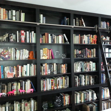 Built-in Bookcases with Rolling Ladder and Hidden Vault