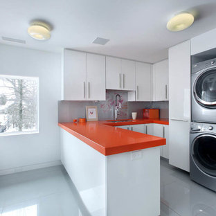 Inspiration for a contemporary utility room in Grand Rapids with orange worktops.