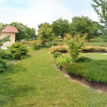 UN JARDIN EN COURBES ROUILLEES / 950 m2 / HAUTE-SAVOIE (74)