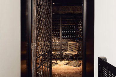 Photo of a traditional wine cellar in Melbourne with storage racks.
