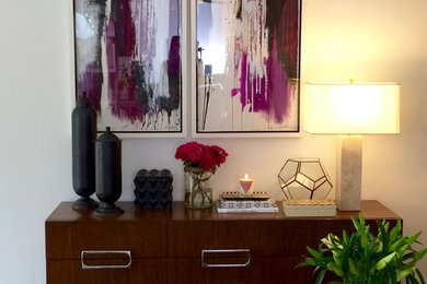 Inspiration for a small modern foyer remodel in Austin with white walls