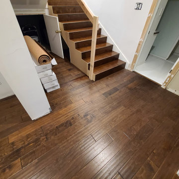 Sleek Engineered Hardwood & Modern Sliding Door by I’m The Man Services