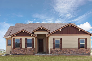 Mid-sized transitional green one-story mixed siding exterior home idea in Denver