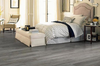 Bedroom - large transitional master bedroom idea in Orange County with beige walls