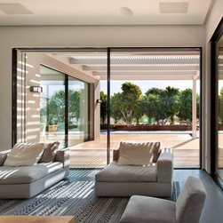 Contemporary Home with Invisible Sliders - Windows And Doors