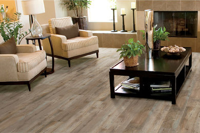 Example of a mid-sized beach style formal and open concept light wood floor living room design in San Francisco with beige walls, a standard fireplace, a tile fireplace and no tv