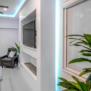 This is an example of a contemporary home cinema in Miami.