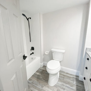 Guest Bathroom: Modern Coastal Condo Transformation