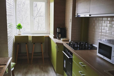 Kitchen - modern kitchen idea in Other
