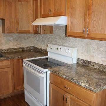 Kitchen Design: StarMark Cabinetry in Cherry Wood, Wilson HD countertop
