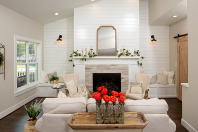 Living room - farmhouse formal dark wood floor and brown floor living room idea in DC Metro with beige walls, a standard fireplace, a tile fireplace and no tv