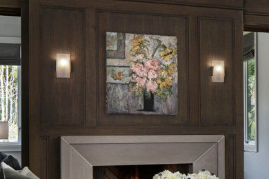 Inspiration for a transitional dark wood floor and brown floor living room remodel in Other with a stone fireplace