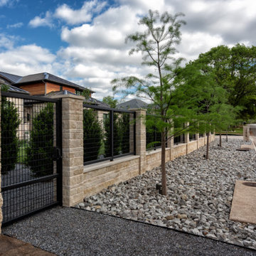 Custom Metal Fence & Electric Driveway Gate with Stone Accents