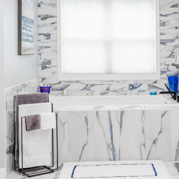 Bathroom remodeling in Columbia, MD with double vanity & marble bathtub
