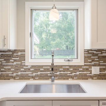 White Cabinets w/ Bar Height Peninsula