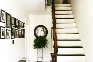 Example of a beach style home design design in Portland Maine