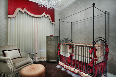 Example of a mid-sized classic girl carpeted nursery design in Phoenix with gray walls