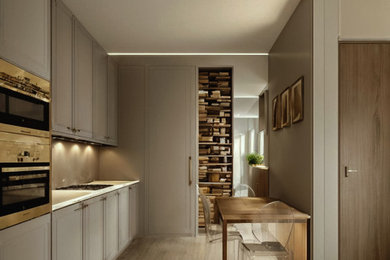 Small contemporary grey and brown single-wall kitchen/diner in London with beaded cabinets, grey cabinets, quartz worktops, grey splashback, stone slab splashback, no island, beige floors, white worktops and feature lighting.