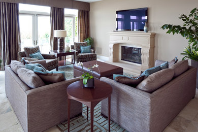 Living room - large transitional formal and open concept living room idea in Orange County with beige walls, a standard fireplace, a stone fireplace and a wall-mounted tv
